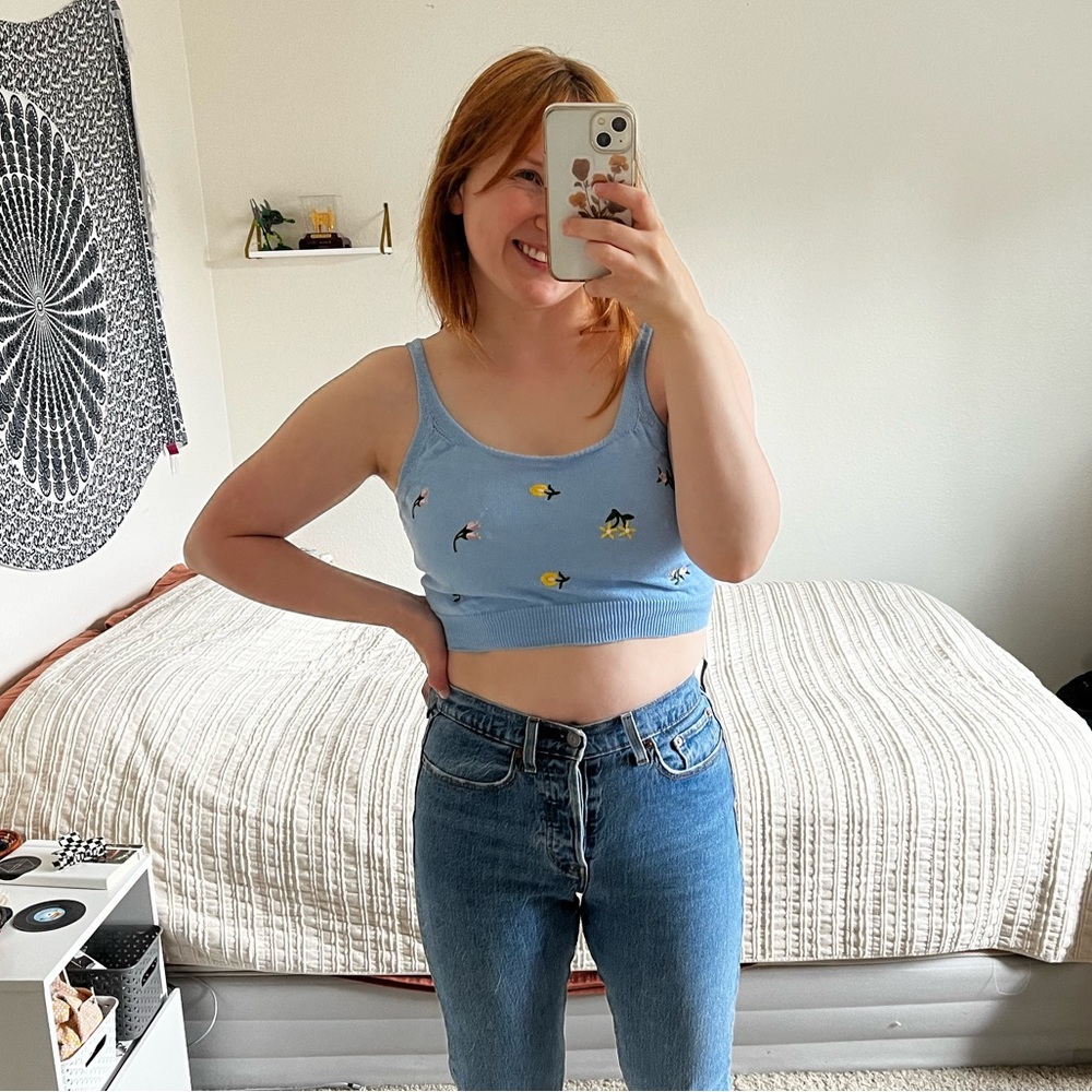 blue sweater tank with floral embroidery